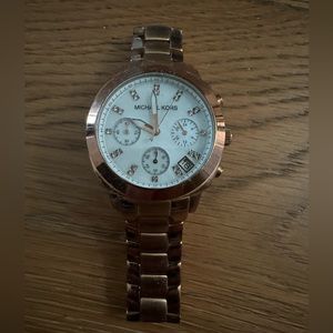 Michaels Kors rose gold watch, needs a new battery